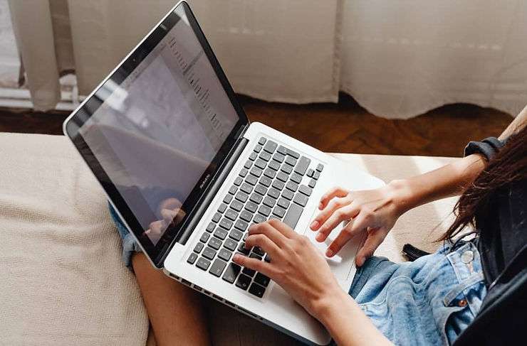 Person working on laptop mosh jd® Woman working on laptop.