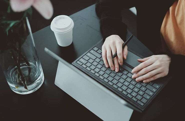Person working on laptop.