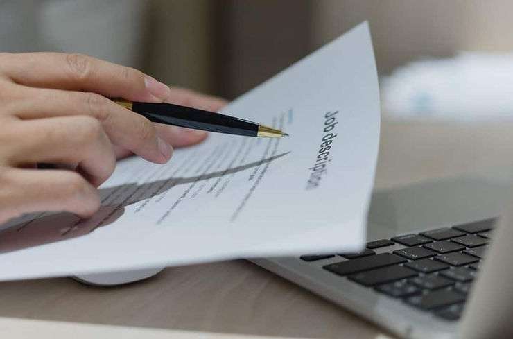 Reviewing job description document.