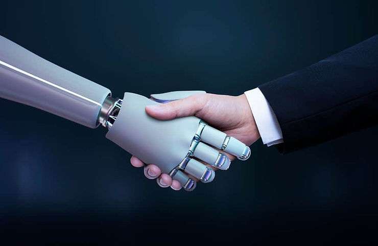 Robot and human shaking hands. 